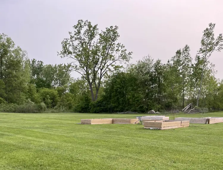 Expansive, public outdoor walking field and Veterans Garden planter beds